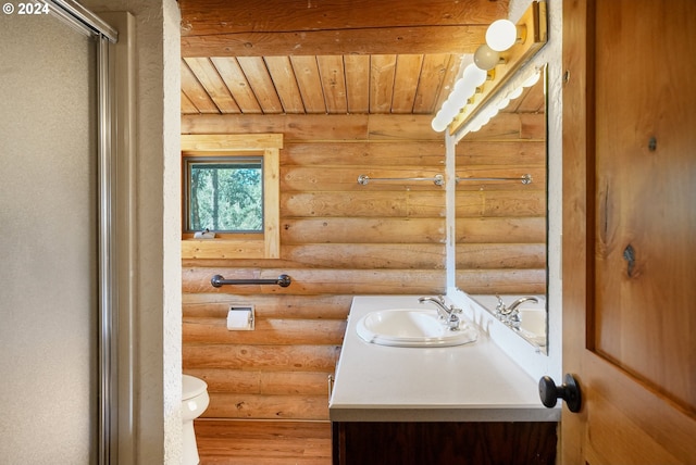 23835 Greasy Creek Rd, Philomath, OR 97370 - full bath featuring log walls, vanity, toilet, wooden ceiling, and an enclosed shower