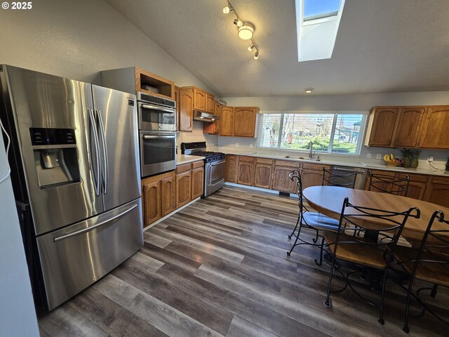 hall with hardwood / wood-style flooring and a notable chandelier