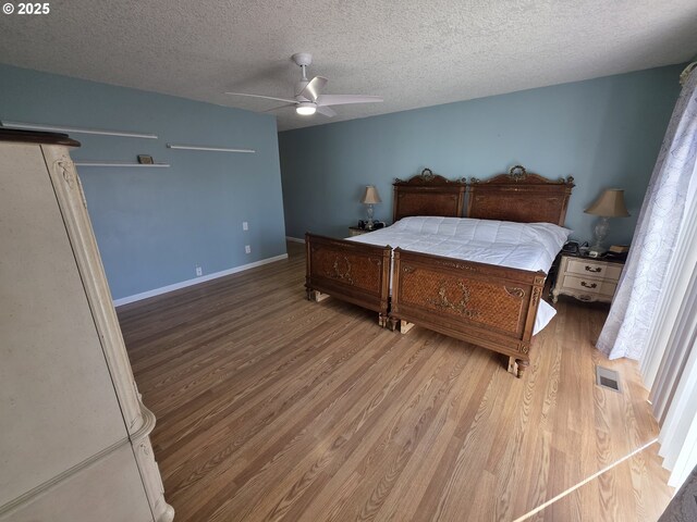 bathroom with toilet, hardwood / wood-style flooring, and shower / tub combo