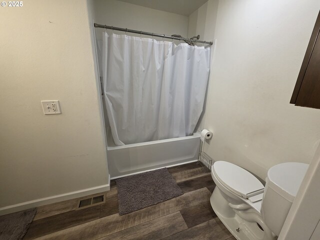 bathroom with tile patterned flooring, vanity, and toilet