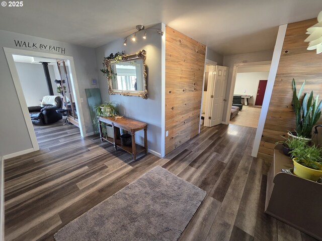 bedroom with ceiling fan, hardwood / wood-style flooring, and a textured ceiling