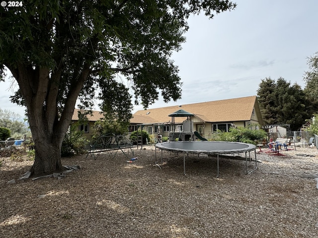 view of yard with a trampoline