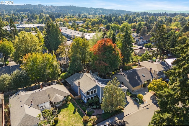 birds eye view of property with a residential view