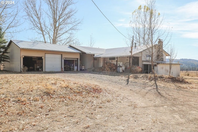 single story home with a garage