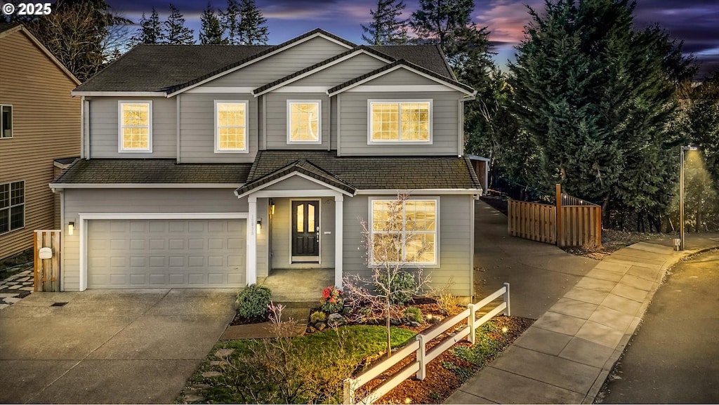 view of front of property featuring a garage