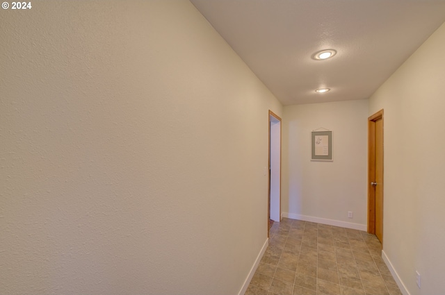 corridor with tile patterned floors