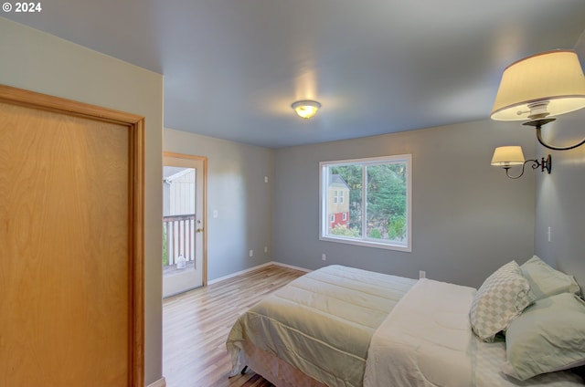 bedroom with wood-type flooring