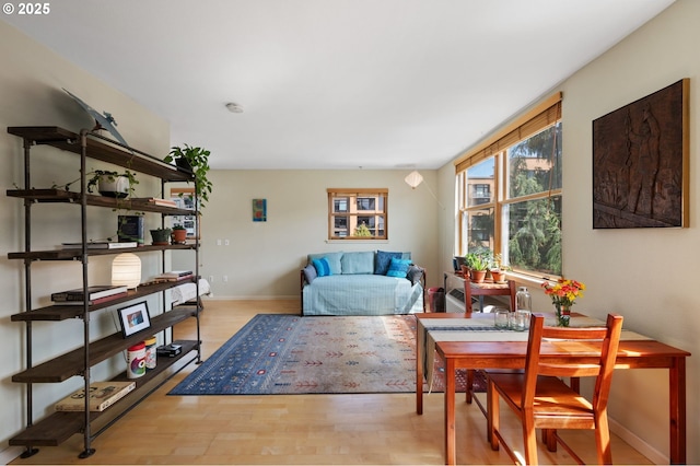 1134 SW Jefferson St Unit 506, Portland, OR 97201 - living area with wood finished floors and baseboards