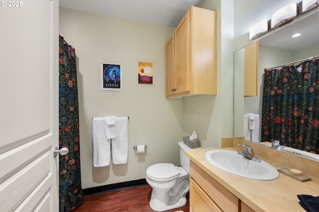 1134 SW Jefferson St Unit 506, Portland, OR 97201 - bathroom with vanity, toilet, and wood finished floors