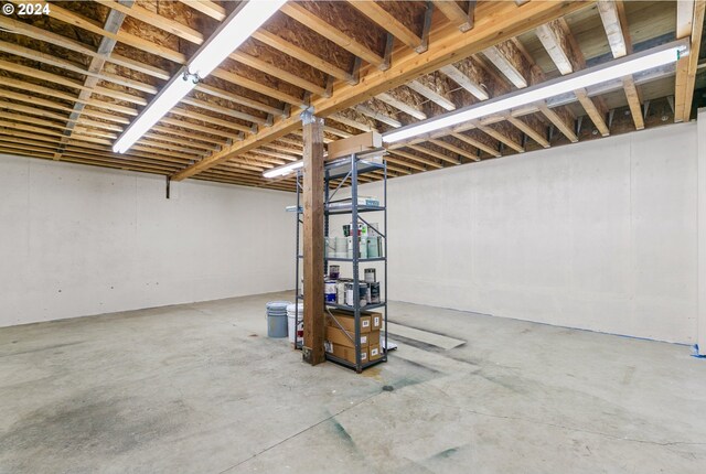 unfurnished bedroom with carpet, a high ceiling, and a closet