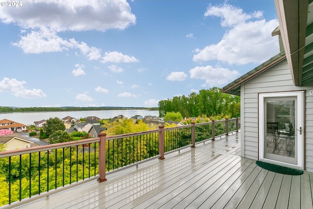 deck featuring a water view