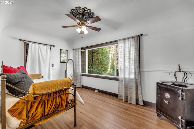 bedroom featuring ceiling fan and light wood-type flooring