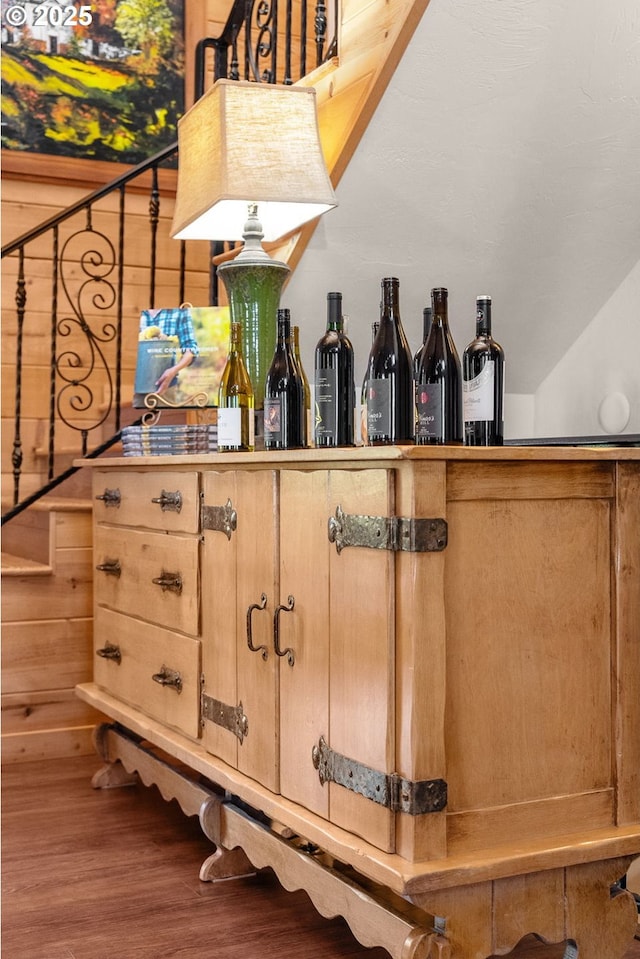 bar featuring hardwood / wood-style floors