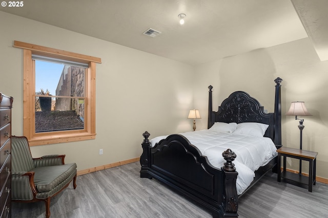 bedroom featuring light wood-type flooring