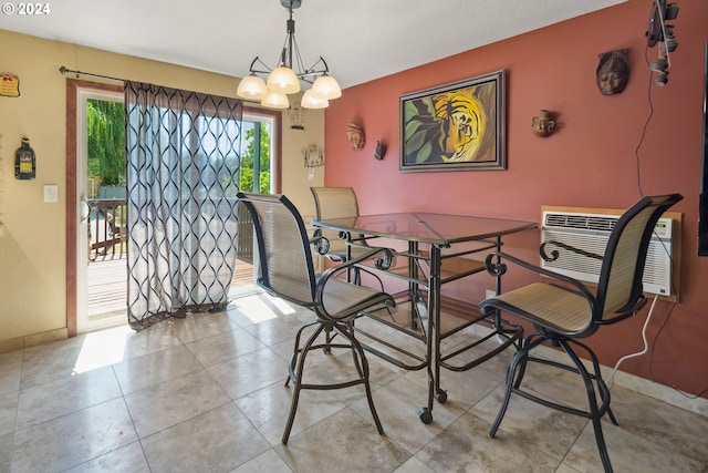 dining room with an inviting chandelier and a wall mounted air conditioner