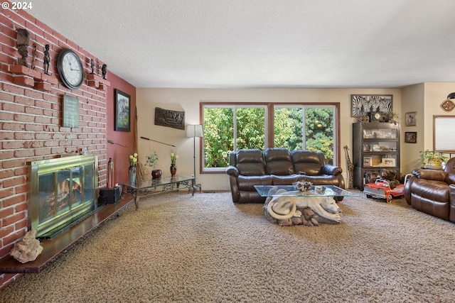 living room with a textured ceiling, carpet floors, and a fireplace