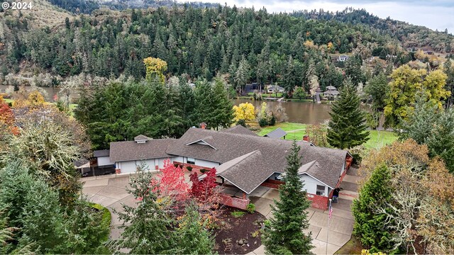 1081 Umpqua College Rd, Roseburg, OR 97470 - view of subject property with a heavily wooded area and a large body of water