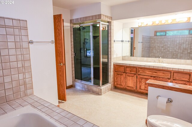 1081 Umpqua College Rd, Roseburg, OR 97470 - bathroom featuring vanity, tiled shower, a tub to relax in, and toilet