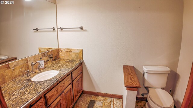 1081 Umpqua College Rd, Roseburg, OR 97470 - half bath with toilet, baseboards, and vanity
