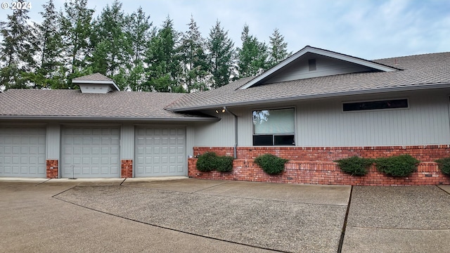 1081 Umpqua College Rd, Roseburg, OR 97470 - view of front of house with brick siding and roof with shingles