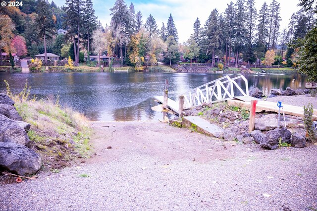 1081 Umpqua College Rd, Roseburg, OR 97470 - water view featuring a boat ramp and a tree filled landscape