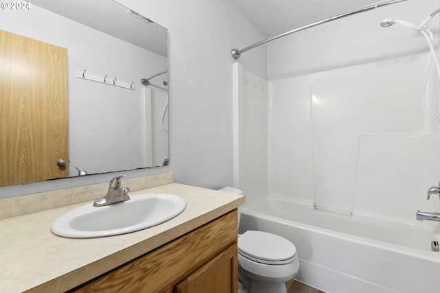 full bathroom with vanity,  shower combination, and toilet