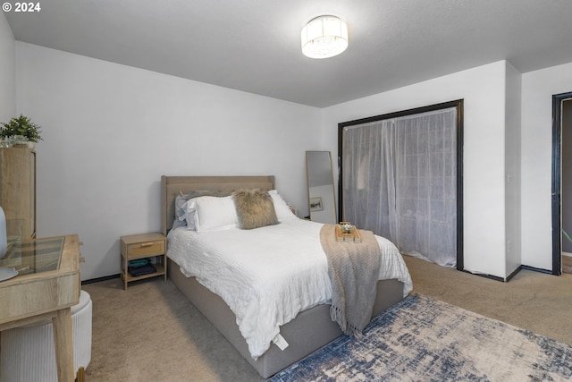 bedroom with light carpet