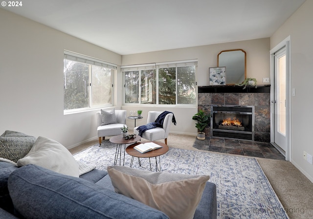 carpeted living room featuring a fireplace