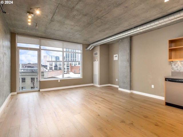 unfurnished room featuring light wood-type flooring