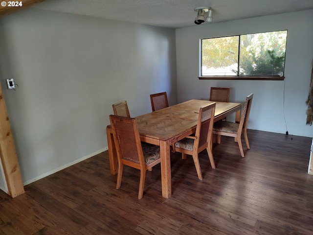 dining room featuring dark hardwood / wood-style floors