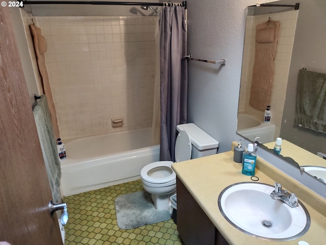 full bathroom with toilet, shower / bath combination with curtain, vanity, and tile patterned floors