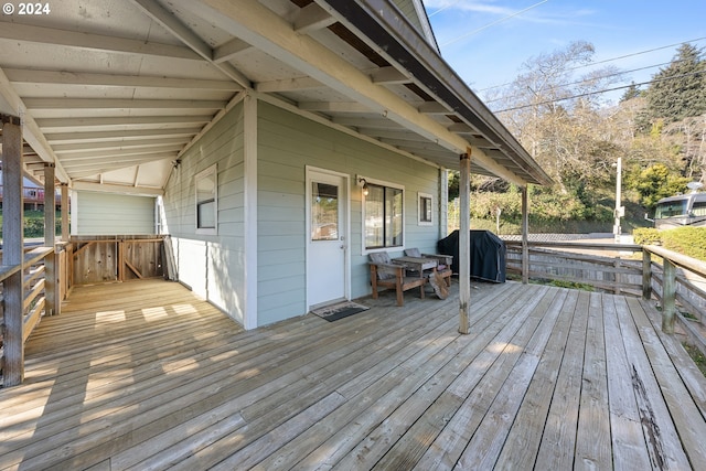 wooden terrace featuring grilling area