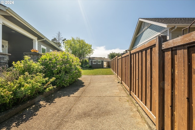 view of side of home featuring a patio area