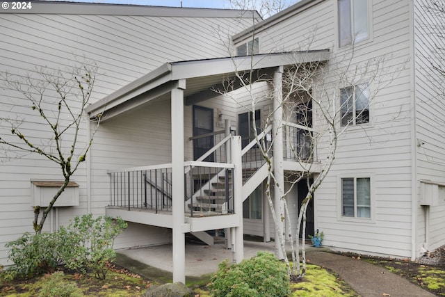 entrance to property with a patio area