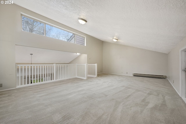 bonus room featuring vaulted ceiling, light carpet, a baseboard radiator, and a textured ceiling