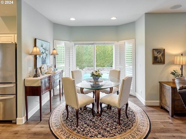 dining room featuring light hardwood / wood-style flooring