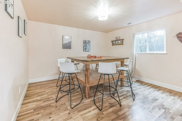 314 S Hazel St, Brookings, OR 97415 - dining area featuring light wood-style flooring and baseboards