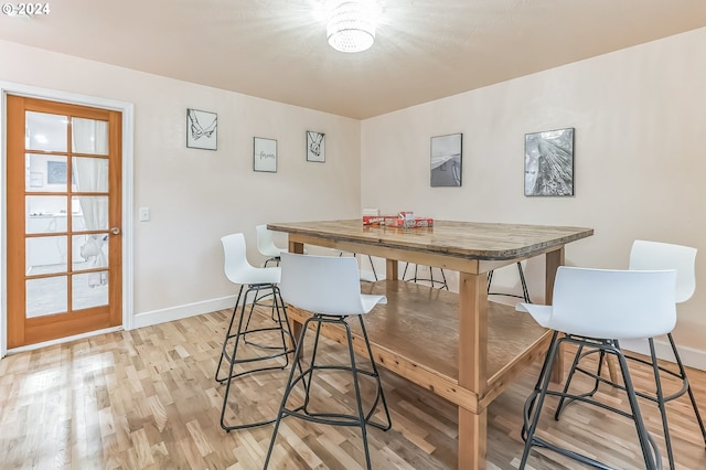314 S Hazel St, Brookings, OR 97415 - dining area featuring light wood-style flooring and baseboards
