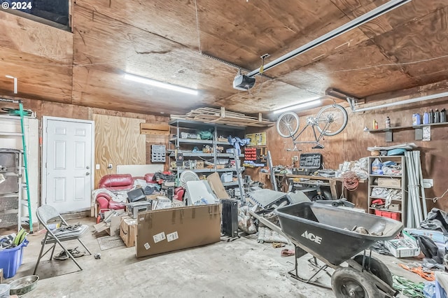 garage featuring a workshop area and a garage door opener