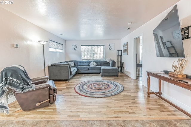 314 S Hazel St, Brookings, OR 97415 - living room featuring wood finished floors and baseboards