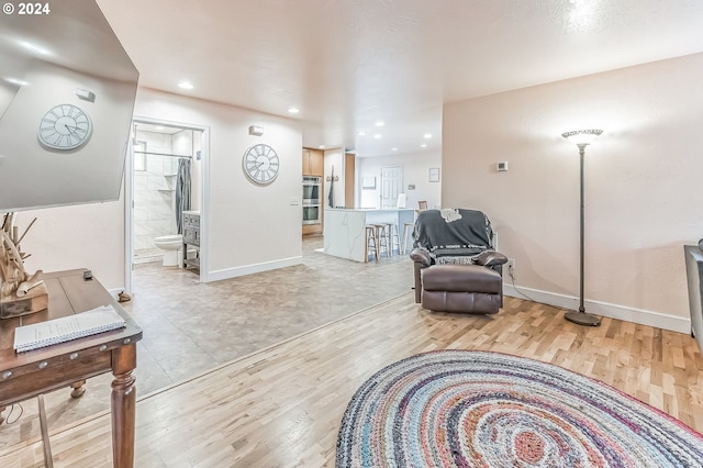 314 S Hazel St, Brookings, OR 97415 - sitting room with light wood-style flooring, baseboards, and recessed lighting