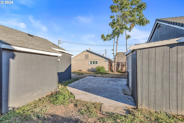 exterior space with a shed