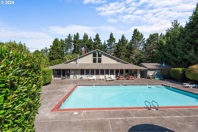 pool with a patio area