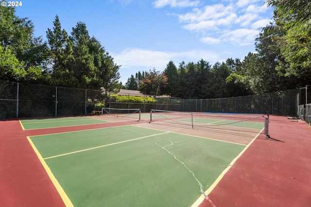 view of sport court featuring community basketball court and fence