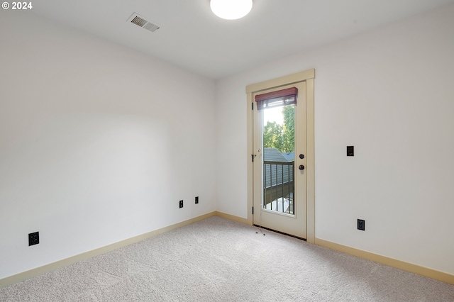 unfurnished room with carpet flooring