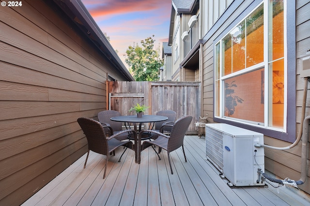 deck at dusk with ac unit