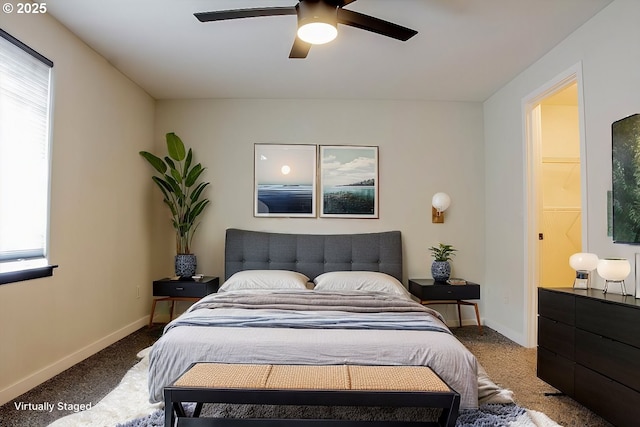 bedroom with multiple windows, carpet floors, and ceiling fan