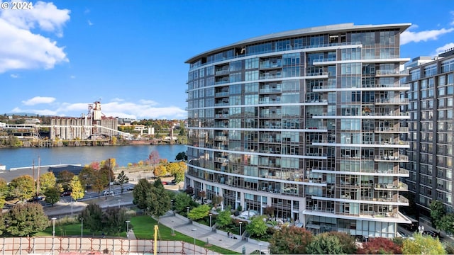 view of building exterior with a water view