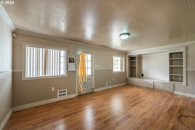 94213 Kerber Dr, Langlois, OR 97450 - unfurnished living room with ornamental molding, light wood-style floors, and baseboards