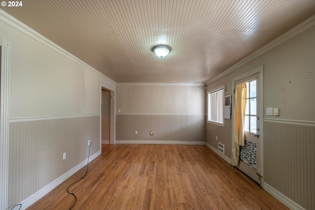 94213 Kerber Dr, Langlois, OR 97450 - empty room featuring wood finished floors and crown molding